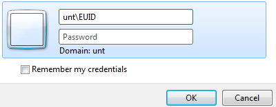 This is a login dialog box asking for username, password, and domain. It also has a checkbox to remember credentials and OK/Cancel buttons.