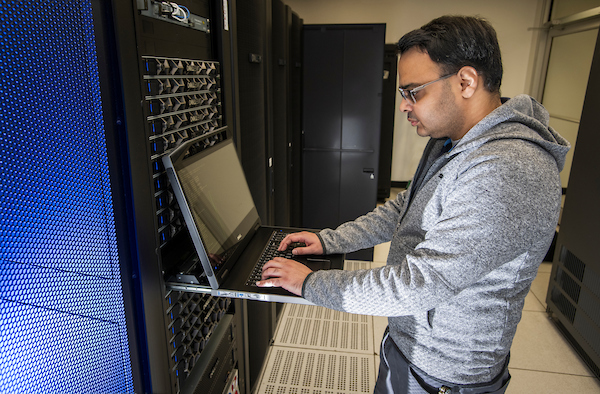 The University of North Texas Chemistry research scientist III, Navneet Khetrapal, works on the newest  high-performance computing server.  Photographed on Jan. 9, 2024 (Ahna Hubnik / UNT)